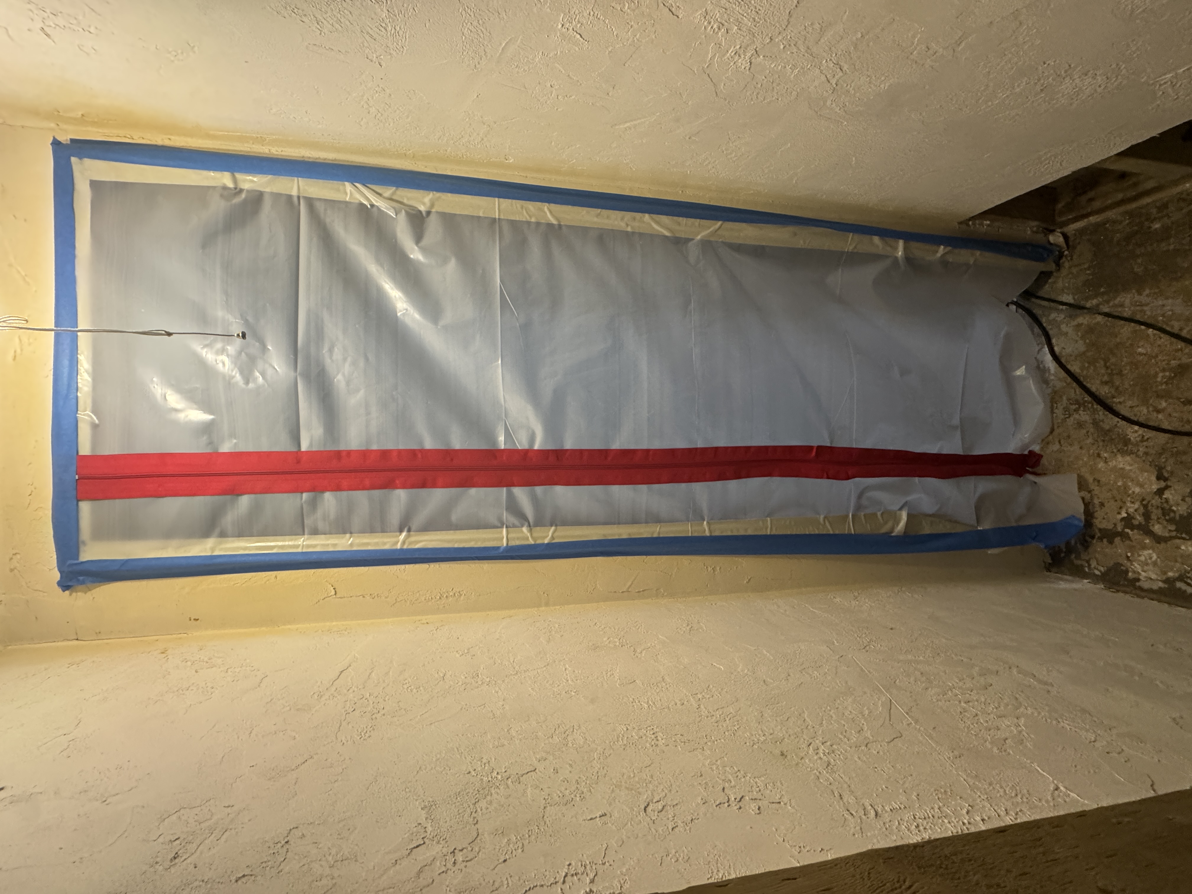 Containment barrier with zipper access for restoration work